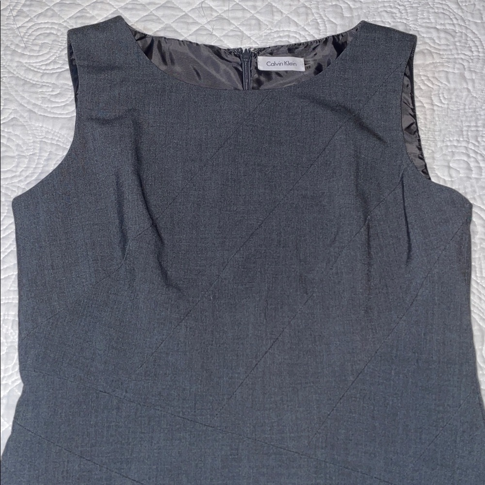 Calvin Klein grey sheath dress. Front asymmetrical layered pleating. Sz 10